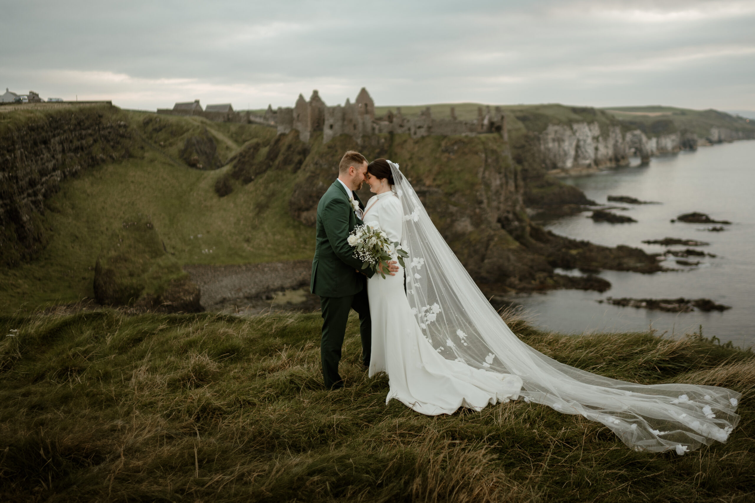 Couple eloping on cliffs of Northern Ireland - UK ETA required